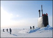USS Connecticut surfaces through Arctic ice